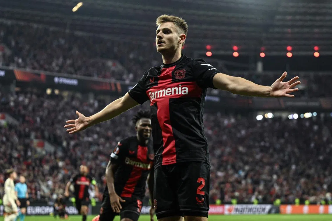 Bayer Leverkusen's Josip Stanisic scored a stoppage-time goal for the Bundesliga champions, to snatch a 2-2 draw against Roma.