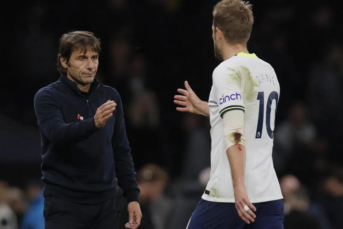 Tottenham Hotspur manager Antonio Conte shakes hands with Harry Kane after the 2-1 loss to Liverpool over the weekend.
