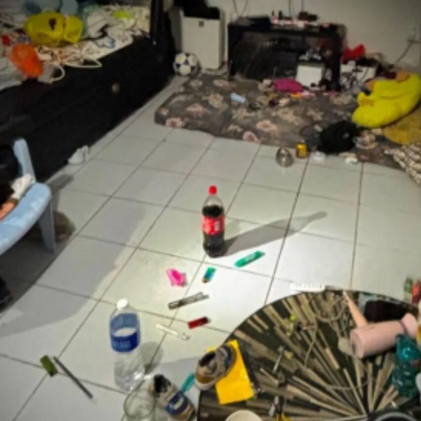 Drug-related equipment in the living room and master bedroom of the residential unit.