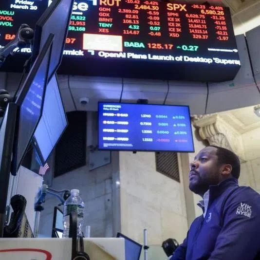 A trader works at the New York Stock Exchange in New York, on March 20.