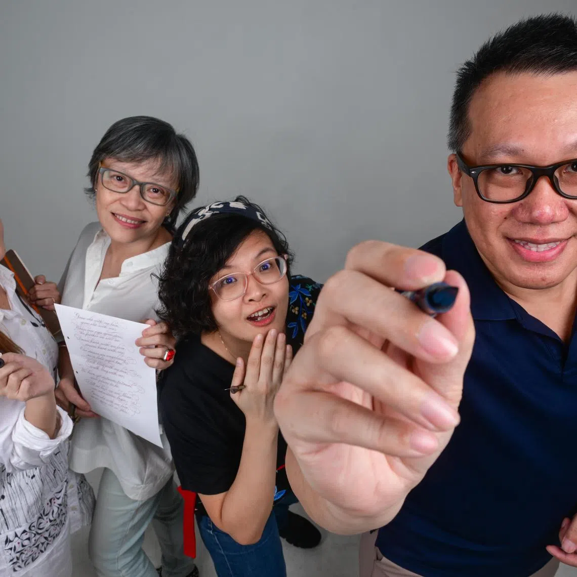 Ms Michelle Lee, 38, calligraphy teacher and preschool educator, Ms Dorothy Lim-Chew, 57, calligrapher, Ms Judith Perera-Lee, 37, graphic designer, penmanship teacher and calligrapher, and Mr Jeffrey Lim, 45, owner of custom pen and nib business, BlueDew Pens.


