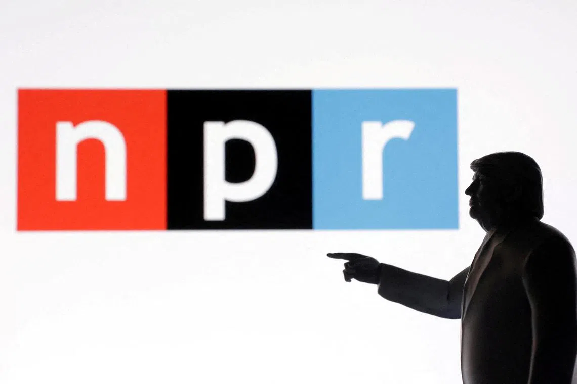 FILE PHOTO: A 3D-printed miniature model of U.S. President Donald Trump with the National Public Radio (NPR) logo in the background is seen in this illustration taken April 23, 2025. REUTERS/Dado Ruvic/Illustration/File Photo