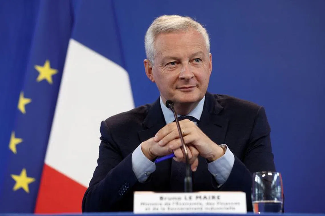 FILE PHOTO: French Minister for Economy, Finance, Industry and Digital Security Bruno Le Maire attends a news conference to present French government 2023 budget bill at the Bercy Finance Ministry in Paris, France, September 26, 2022. REUTERS/Benoit Tessier/File photo