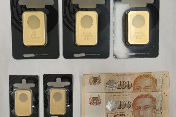Police seized gold bars worth about $200,000 from the woman.