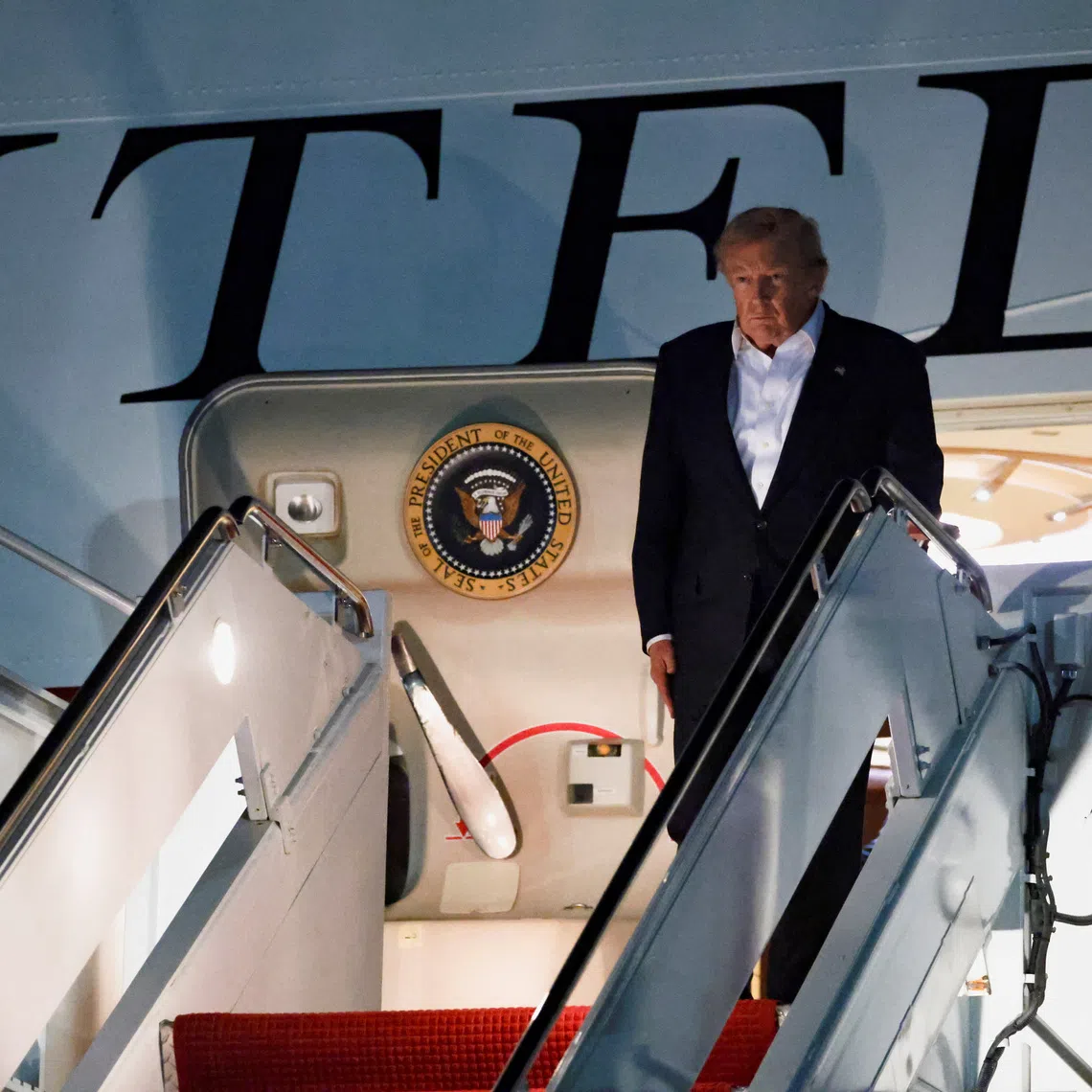 U.S. President Donald Trump arrives aboard the new Qatari-gifted Air Force One, as he returns to Washington after participating in a NATO leaders' summit in Turkey, at Joint Base Andrews, Maryland, U.S., July 9, 2026. REUTERS/Jonathan Ernst