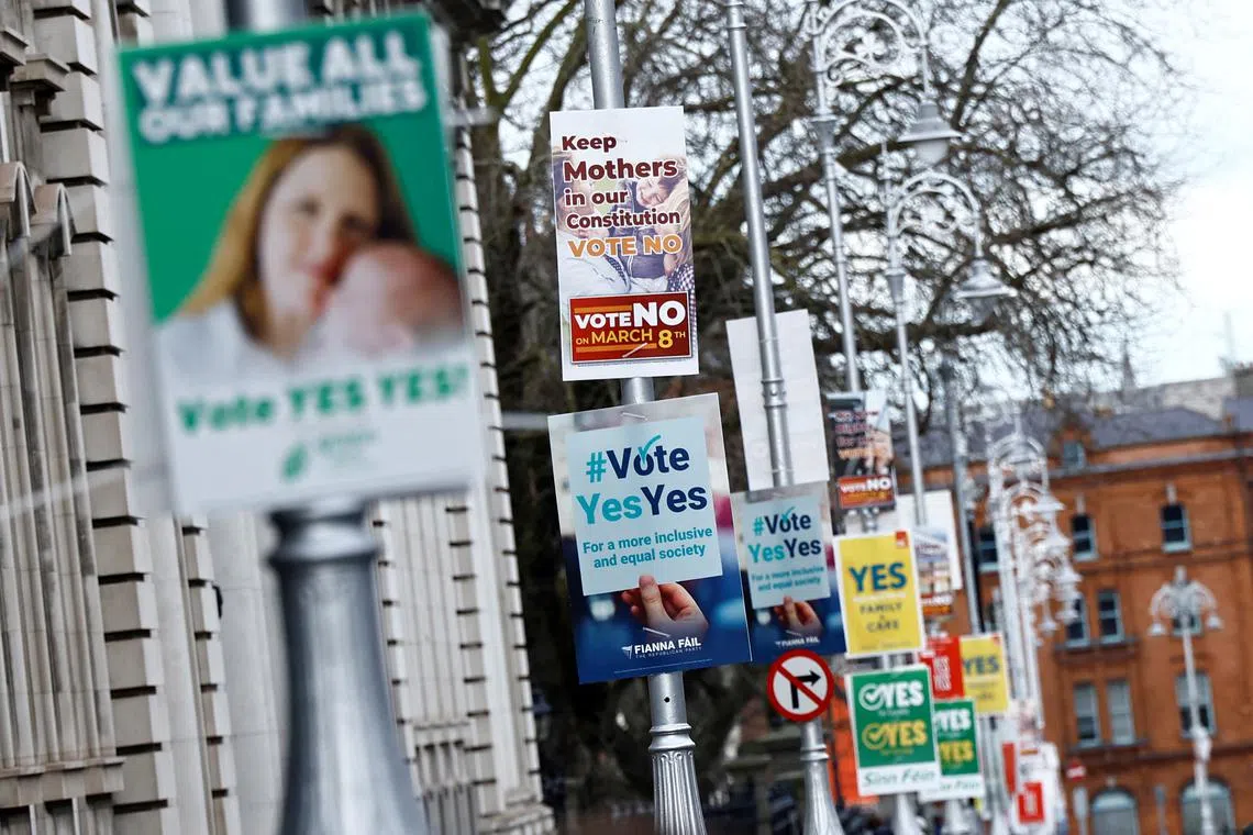 Signage is seen in relation to a referendum on changes to the Irish constitution called the Family Amendment and the Care Amendment, in Dublin, Ireland, March 3, 2024. REUTERS/Clodagh Kilcoyne/File Photo
