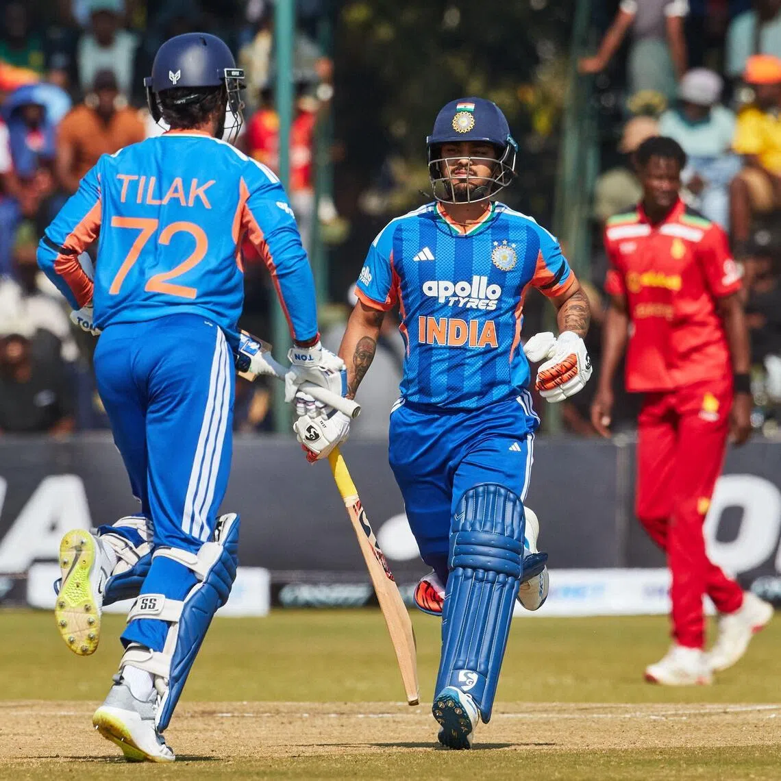 India's Ishan Kishan (C) runs between the wickets during the second Twenty20 international cricket match between Zimbabwe and India at Harare Sports Club in Harare, on July 25, 2026. (Photo by Jekesai NJIKIZANA / AFP)