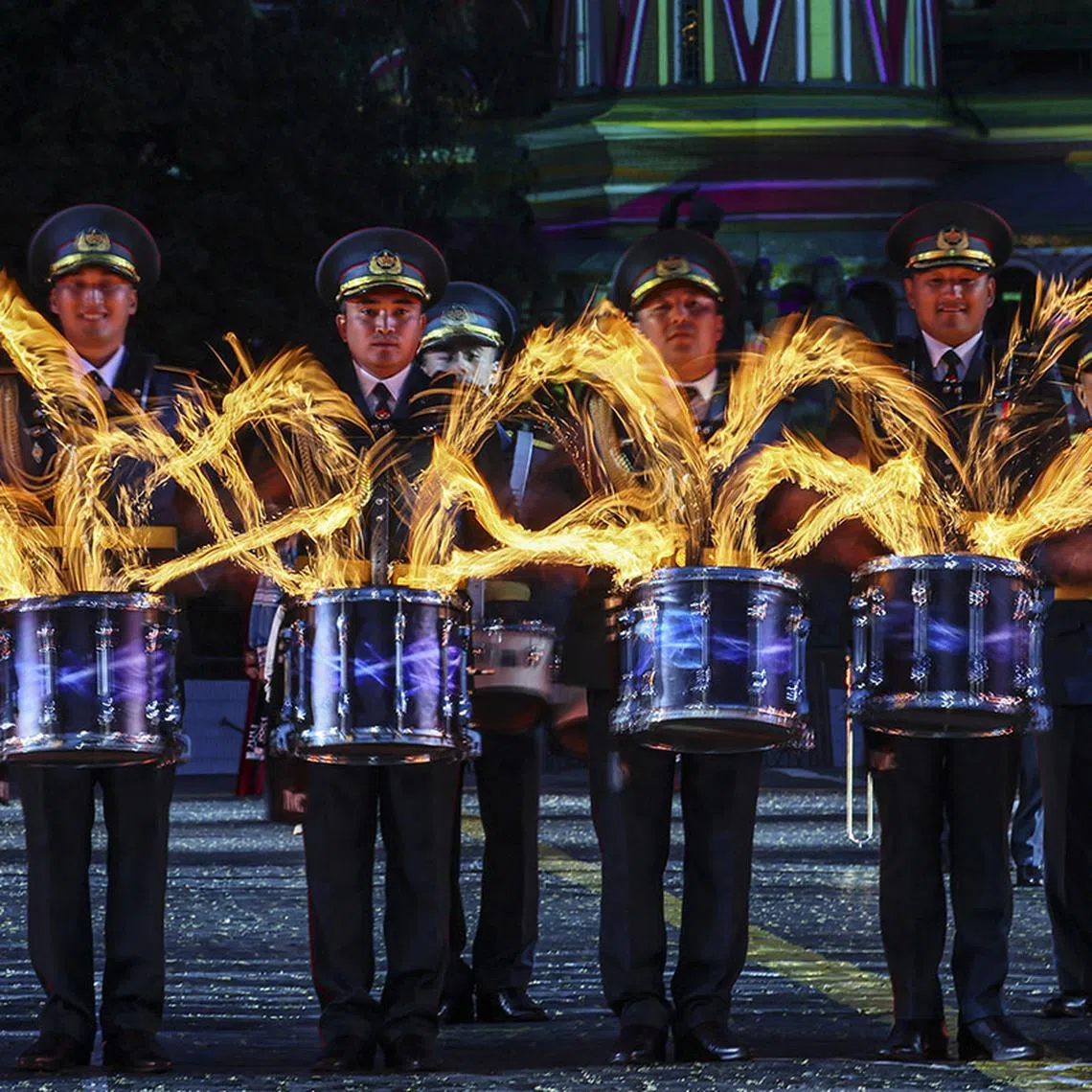 epa12314654 Members of the Central Military Band and the Central Ensemble of the National Military and Patriotic Center of the Kazakhstan Armed Forces perform during the opening of the International Military Music Festival 'Spasskaya Tower' on the Red Square in Moscow, Russia, 21 August 2025. The festival runs from 21 to 31 August 2025. EPA/YURI KOCHETKOV