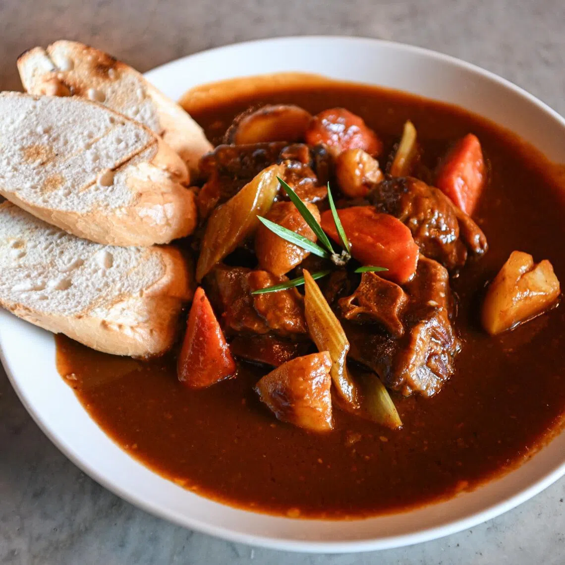 Oxtail stew from British Hainan Heritage Restaurant at Kallang Way on March 18, 2026. ST PHOTO: AZMI ATHNI