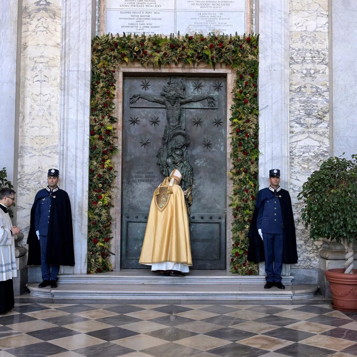 Cardinal Baldo Reina closing a Holy Door, as part of the end of the Catholic Jubilee Year, in Rome on Dec 27, 2025.