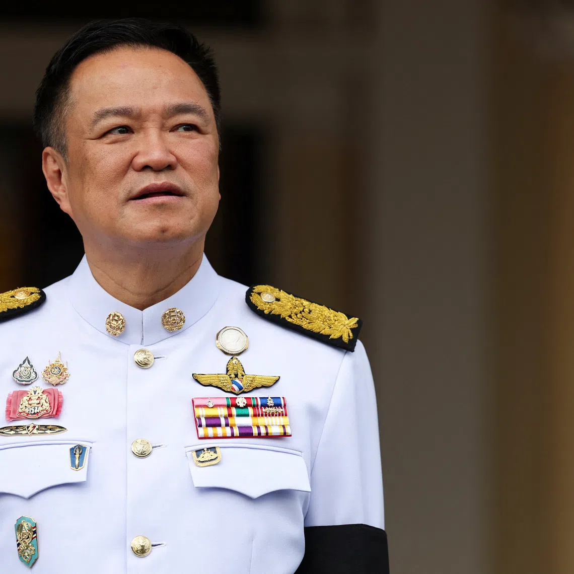 Thailand's Prime Minister Anutin Charnvirakul looks on ahead of making offerings to monks, on the day he speaks to members of the media to announce the dissolution of parliament at the Government House in Bangkok, Thailand, December 12, 2025. REUTERS/Chalinee Thirasupa