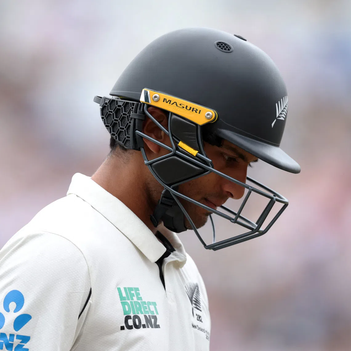 FILE PHOTO: Cricket - England v New Zealand - Third Test - Trent Bridge Cricket Ground, Nottingham, Britain - June 28, 2026  New Zealand's Rachin Ravindra walks off after losing his wicket to the bowling of England's Shoaib Bashir Action Images via Reuters/Andrew Boyers/ File Photo