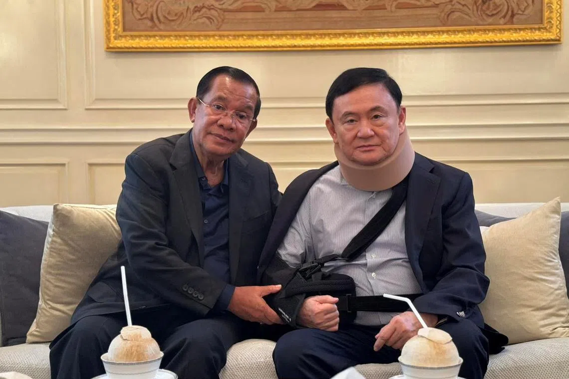 Cambodia's former Prime Minister Hun Sen (left) with Thailand’s ex-prime minister Thaksin Shinawatra, in Bangkok, on Feb 21.