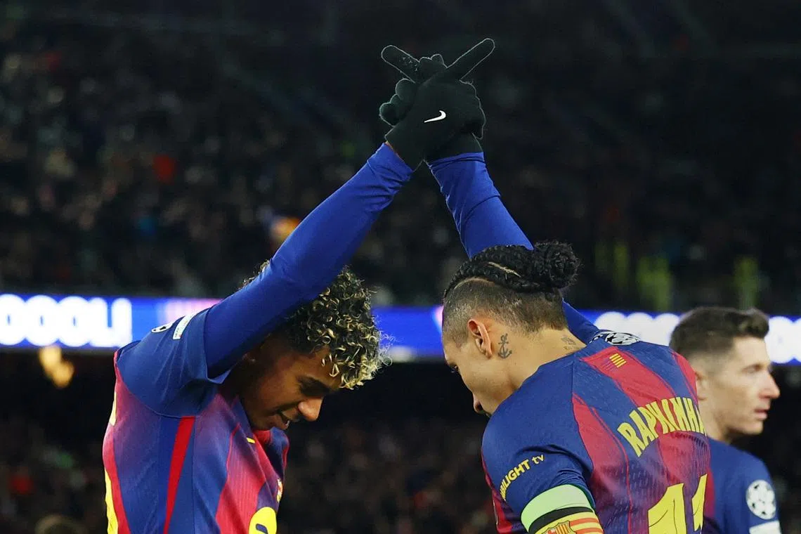 Soccer Football - UEFA Champions League - FC Barcelona v FC Copenhagen - Spotify Camp Nou, Barcelona, Spain - January 28, 2026 FC Barcelona's Raphinha celebrates scoring their third goal with  Lamine Yamal REUTERS/Albert Gea