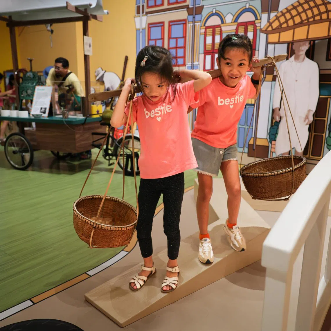 In a game of Here Comes The Teh Gu, your kids can pretend to be unlicensed street hawkers and escape from teh gu, or inspectors, making their rounds.