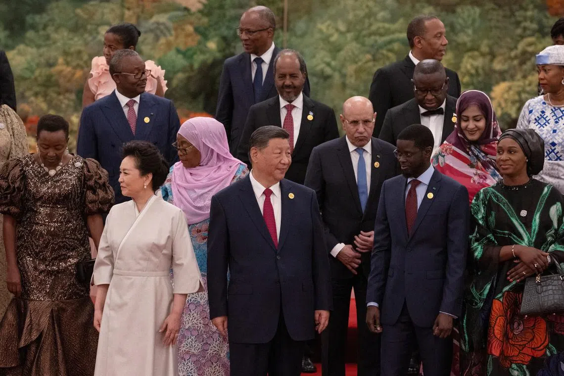 China's President Xi Jinping and his wife Peng Liyuan stand for a group photo together with leaders from African countries before a welcome dinner of the Forum on China-Africa Cooperation (FOCAC) in the Great Hall of the People in Beijing, China, 04 September 2024.  ANDRES MARTINEZ CASARES/Pool via REUTERS