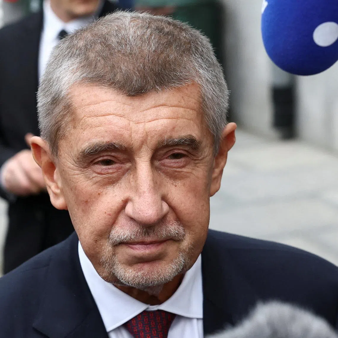 Czech Republic Prime Minister Andrej Babis speaks to the media as he arrives at the Patriots for Europe (PfE) party meeting in Brussels, Belgium, December 17, 2025. REUTERS/Yves Herman
