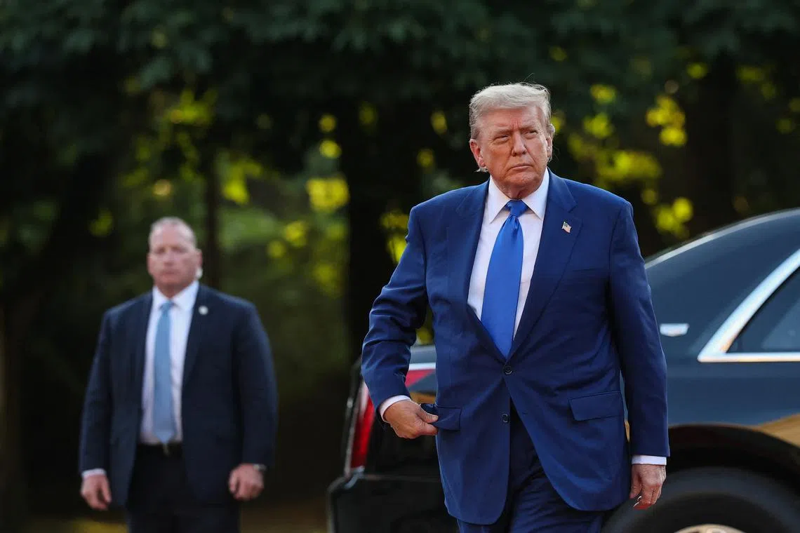U.S. President Donald Trump arrives at a dinner for NATO heads of state and governments hosted by Dutch King Willem-Alexander and Dutch Queen Maxima, on the sidelines of a NATO Summit, at Huis ten Bosch Palace in The Hague, Netherlands June 24, 2025. REUTERS/Toby Melville
