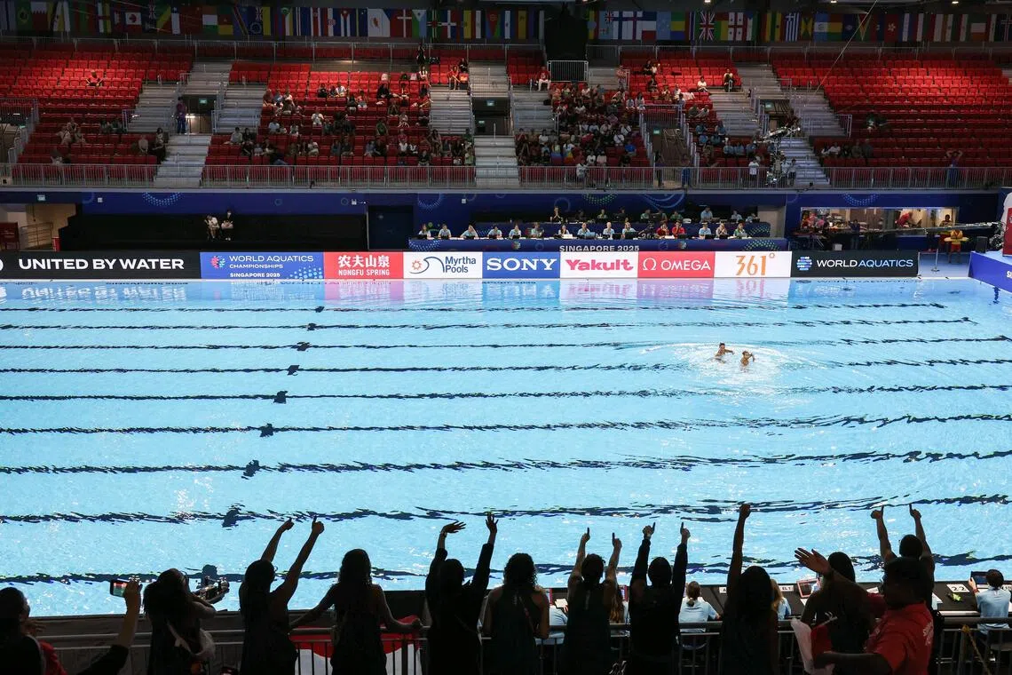Fans cheering on Eygptian artistic swimmers Zeina Amr and Maryam Samer during the World Aquatics Championships (WCH) at the WCH Arena on July 18, 2025. 