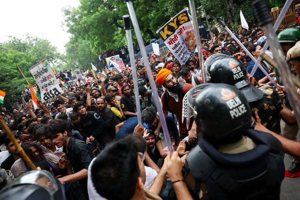 Protesters scuffle with police on July 20.