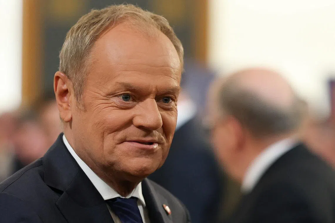 Polish Prime Minister Donald Tusk attends a signing ceremony for Poland's SAFE programme loan agreement, making it the first EU member state to sign the agreement, in Warsaw, Poland, May 8, 2026. REUTERS/Kacper Pempel