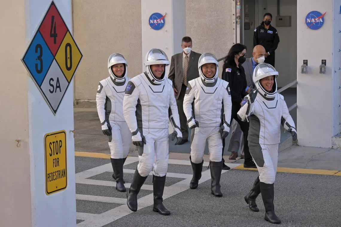 FILE PHOTO: NASA's Crew 5 members depart their crew quarters for launch aboard a SpaceX Falcon 9 rocket at the Kennedy Space Center in Cape Canaveral, Florida, U.S. October 5, 2022. REUTERS/Steve Nesius/File Photo