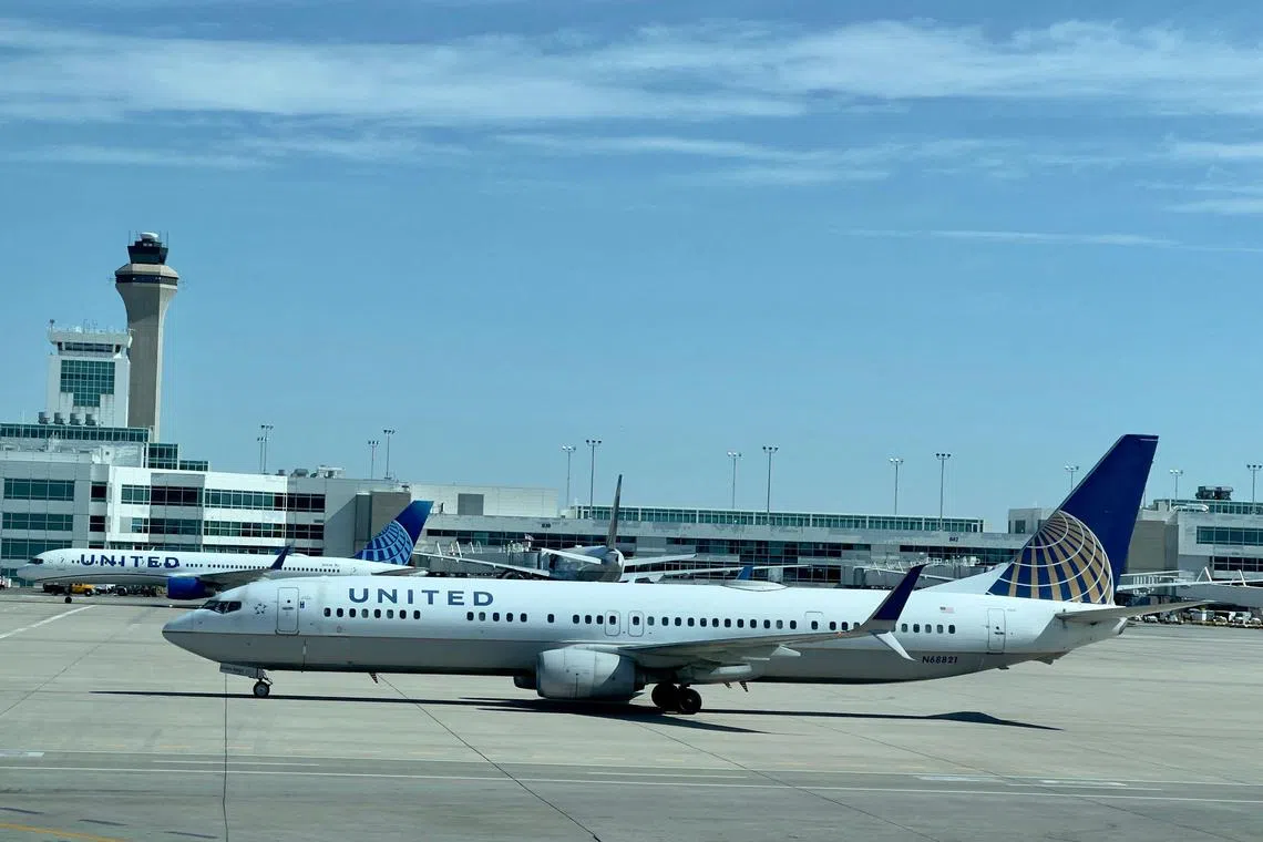United Airlines planes taxi at Denver International Airport (DEN) in Denver, Colorado, on July 30, 2023. (Photo by Daniel SLIM / AFP)