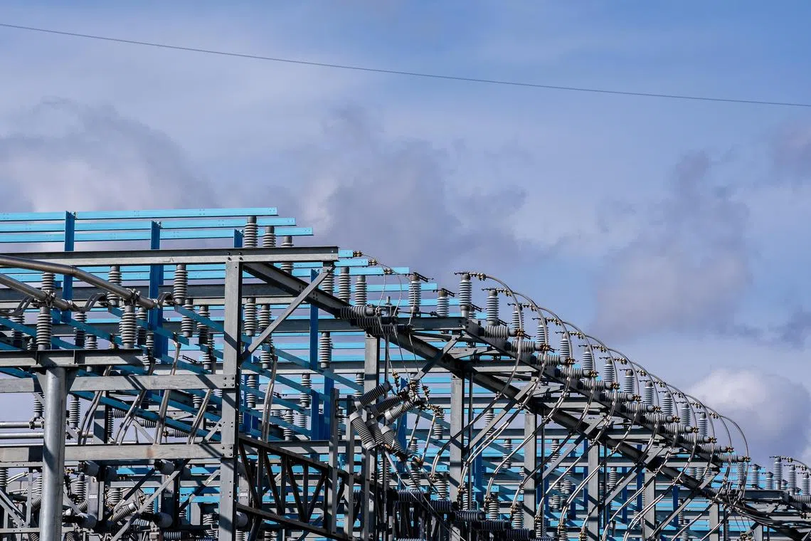 A power substation near a CloudHQ data center in Ashburn, Va., March 10, 2024. A boom in data centers and factories is straining electric grids and propping up fossil fuels. (Nathan Howard/The New York Times)