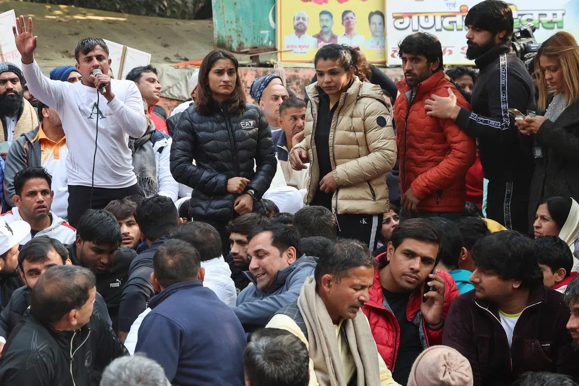 FILE PHOTO: Vinesh Phogat, Sakshi Malik, Bajrang Punia and other Indian wrestlers take part in a protest demanding the disbandment of the WFI and the investigation of its head by the police, who they accuse of sexually harassing female players, at Jantar Mantar in New Delhi, India, January 19, 2023. REUTERS/Anushree Fadnavis/File Photo