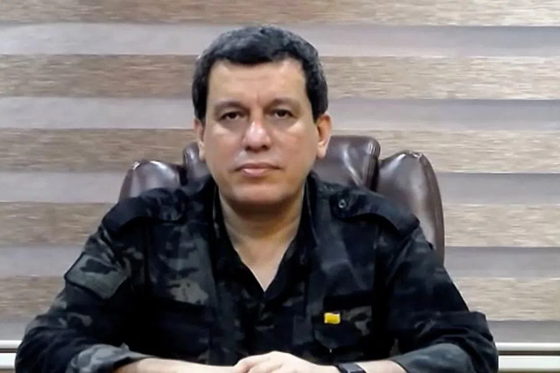 The head of the U.S.-backed Syrian Democratic Forces, Mazloum Abdi, speaks from northeast Syria  during an interview on Zoom with Reuters in Beirut, Lebanon September 7, 2023, in this still image taken from a video. REUTERS TV/via REUTERS