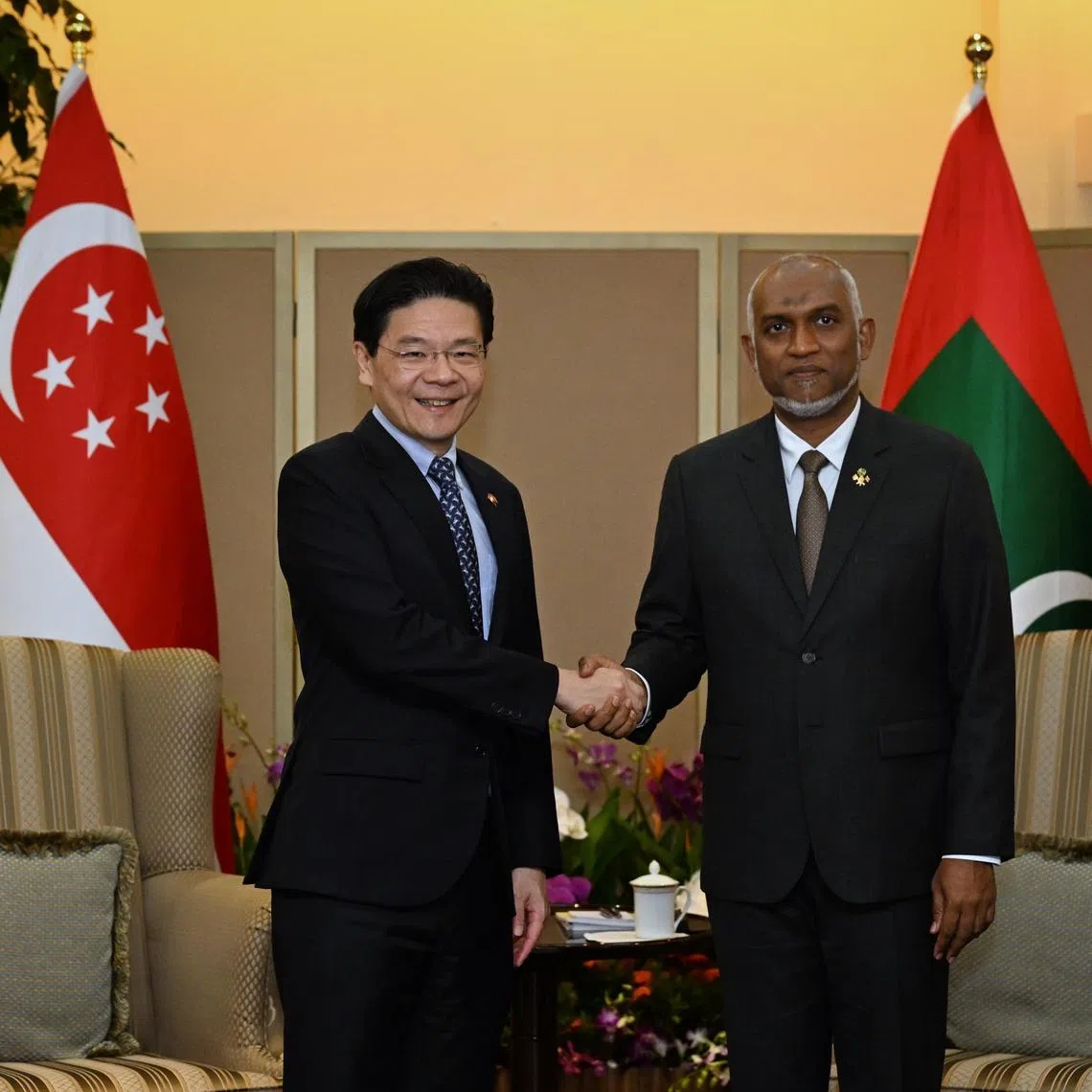 From left: PM Lawrence Wong shaking hands with His Excellency (HE) Dr Mohamed Muizzu, President of the Republic of Maldives during the state visit at the Ministry of Foreign Affairs on June 30, 2025