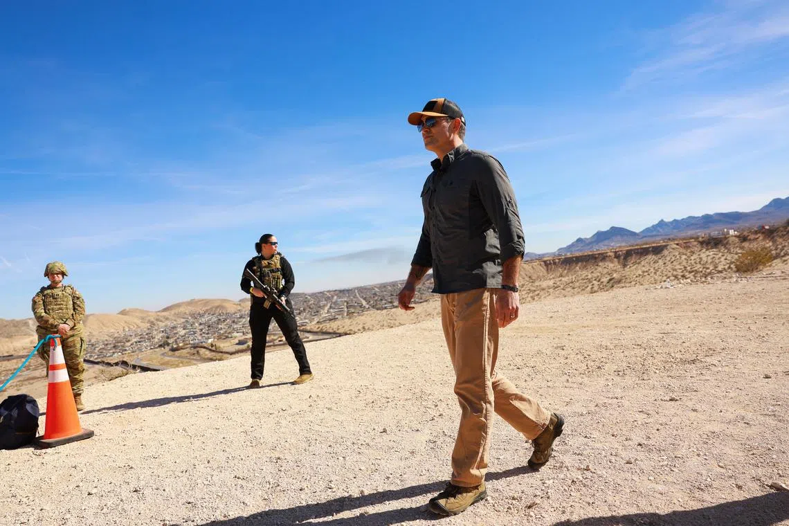 U.S. Defense Secretary Pete Hegseth walks, as he meets with U.S. military personnel, during a visit to the border area in Sunland Park, New Mexico, February 3, 2025. REUTERS/Jose Luis Gonzalez