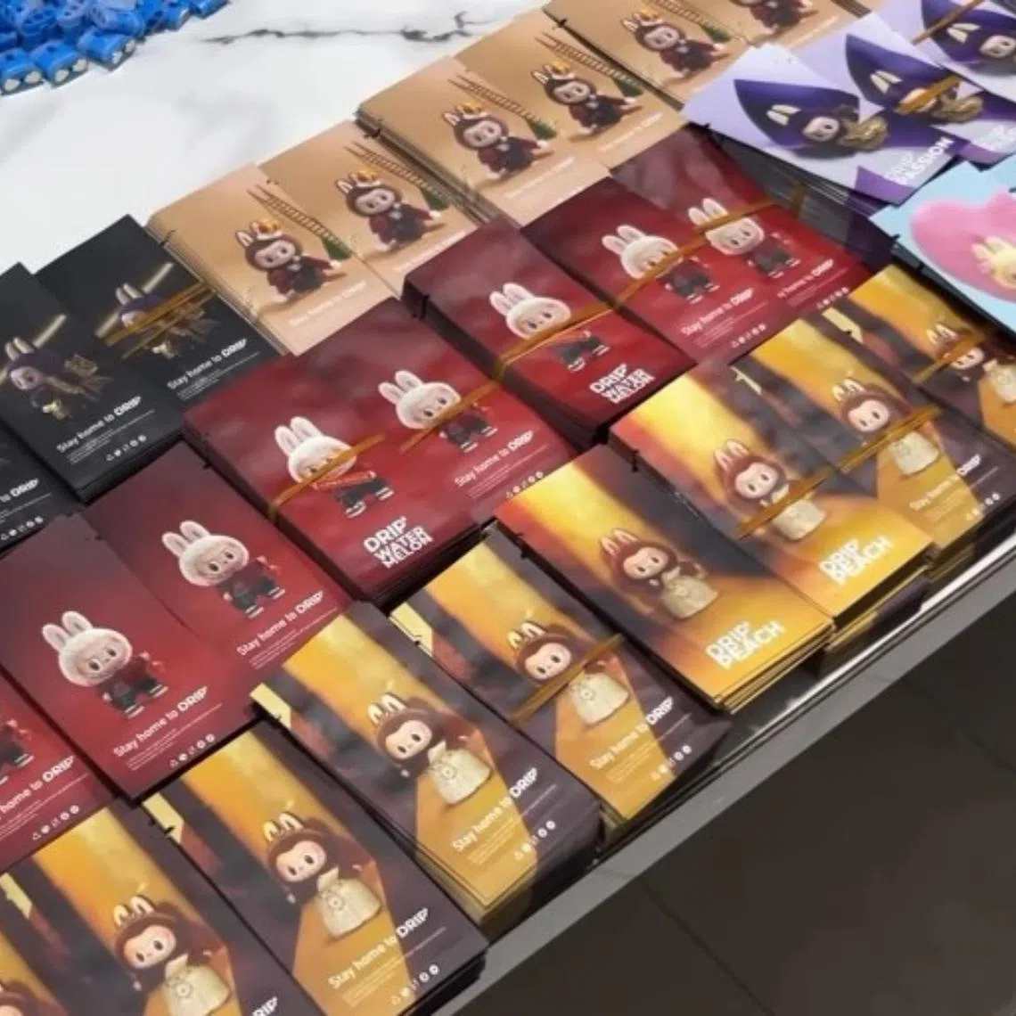Labubu doll-branded packages used for vape products that were produced and distributed from a luxury residence in Medan.