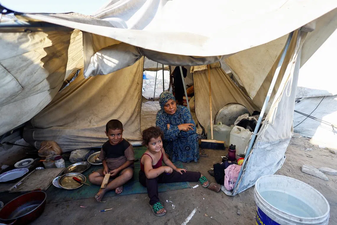 Palestinians displaced by the Israeli military offensive take shelter in a tent camp, as Israeli forces escalate operations around Gaza City, in Gaza City, September 3, 2025. REUTERS/Mahmoud Issa