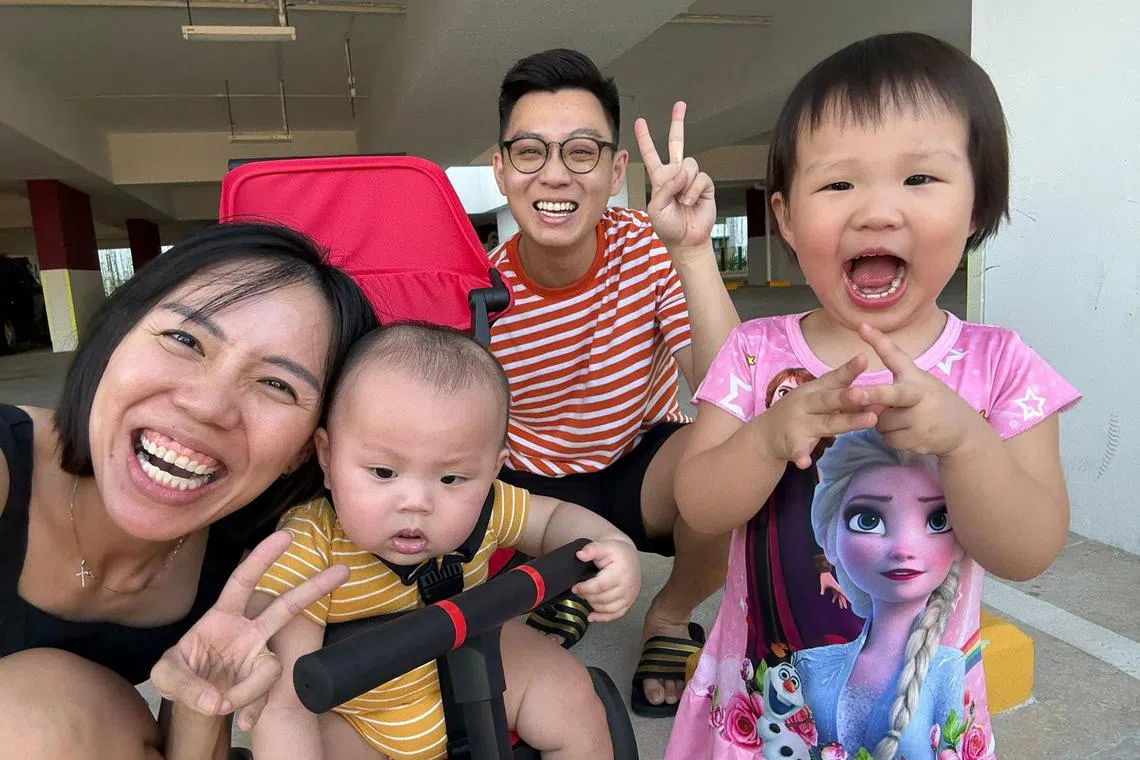 thbaby19 - Ms Joanna Wee, a 35-year-old physiotherapist, her husband Gary Chua, a 35-year-old facilities management director, and their children. Ms Wee is holding her son, Matthias., who is now 7 months old. While Cara, 2, is posing for the picture.

Credit: Joanna Wee