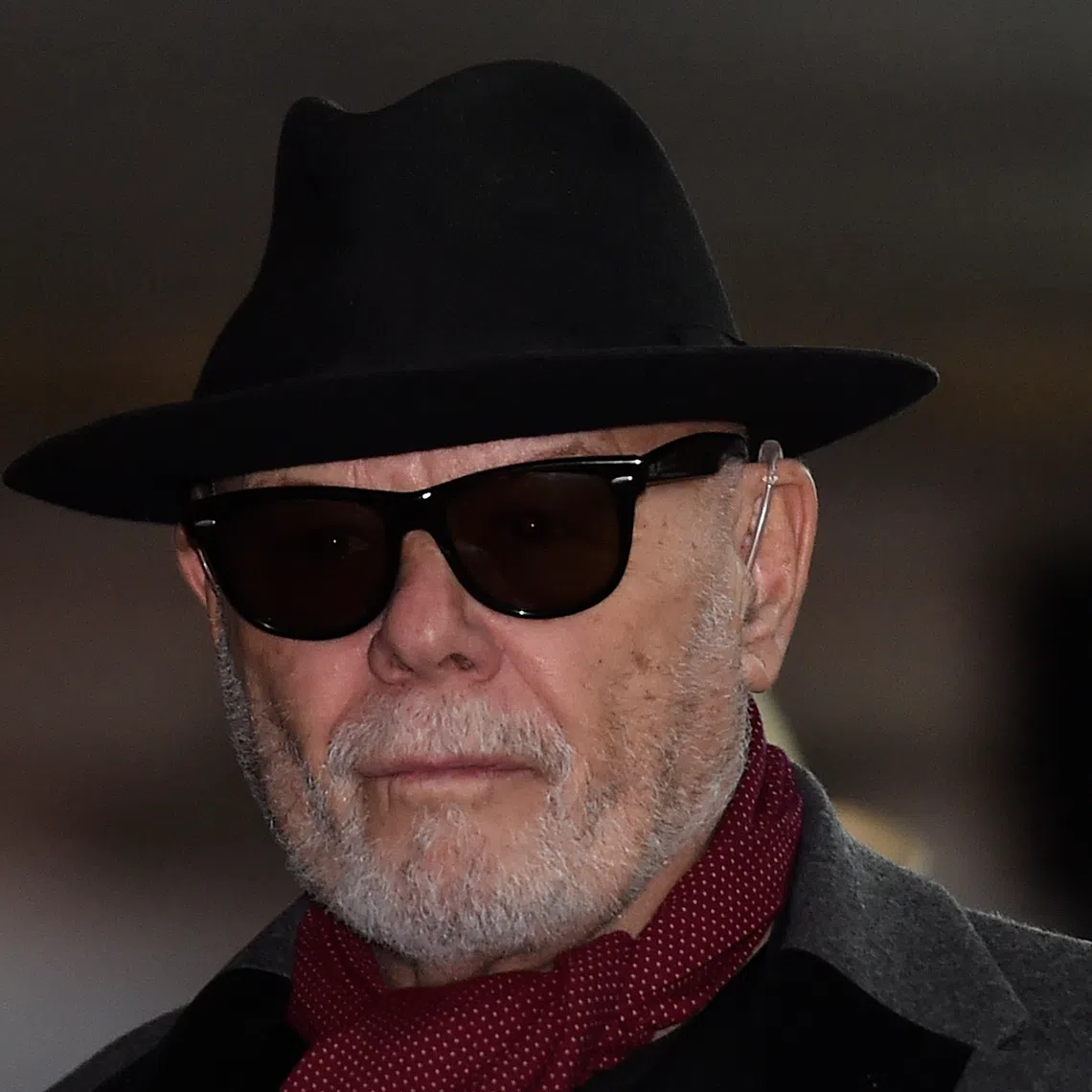FILE PHOTO: British former pop star Gary Glitter, whose real name is Paul Gadd, leaves Southwark Crown Court in London February 4, 2015. REUTERS/Toby Melville/ File Photo