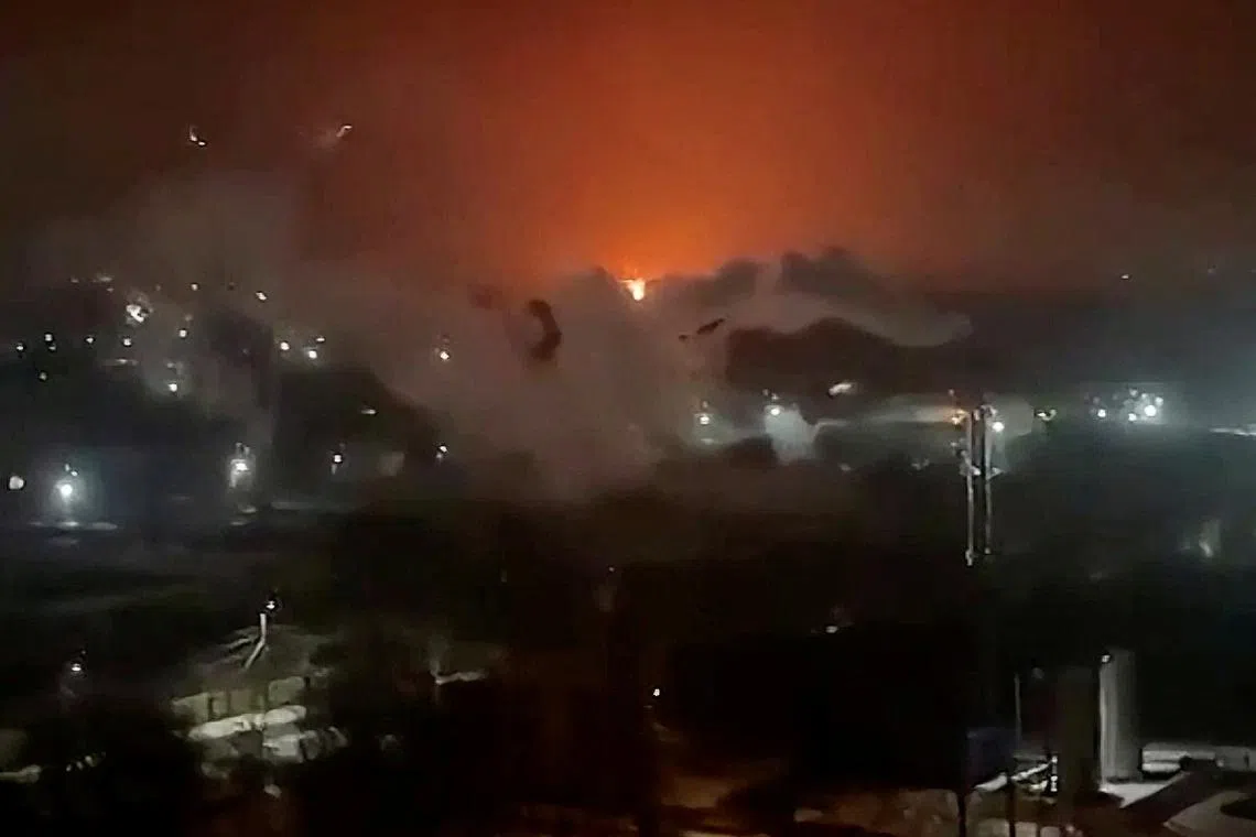 Flames and smoke rise from an oil depot in Bryansk, Bryansk Region, Russia, released on December 11, 2024, in still image obtained from social media video. SOCIAL MEDIA/via REUTERS