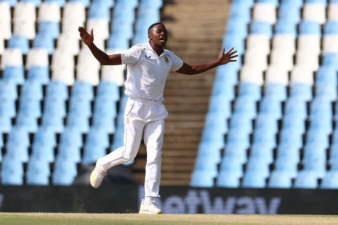 Cricket - First Test - South Africa v West Indies - SuperSport Park Cricket Stadium, Centurion, South Africa - March 2, 2023 South Africa's Kagiso Rabada celebrates after taking the wicket of West Indies' Jason Holder REUTERS/Siphiwe Sibeko/File Photo