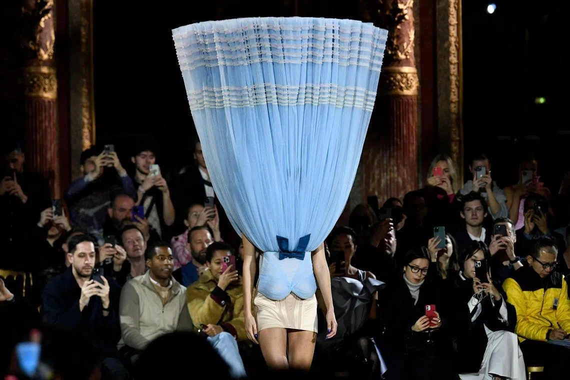 A model presents a creation for Viktor & Rolf during the Haute-Couture Spring-Summer 2023 Fashion Week in Paris on January 25, 2023. 