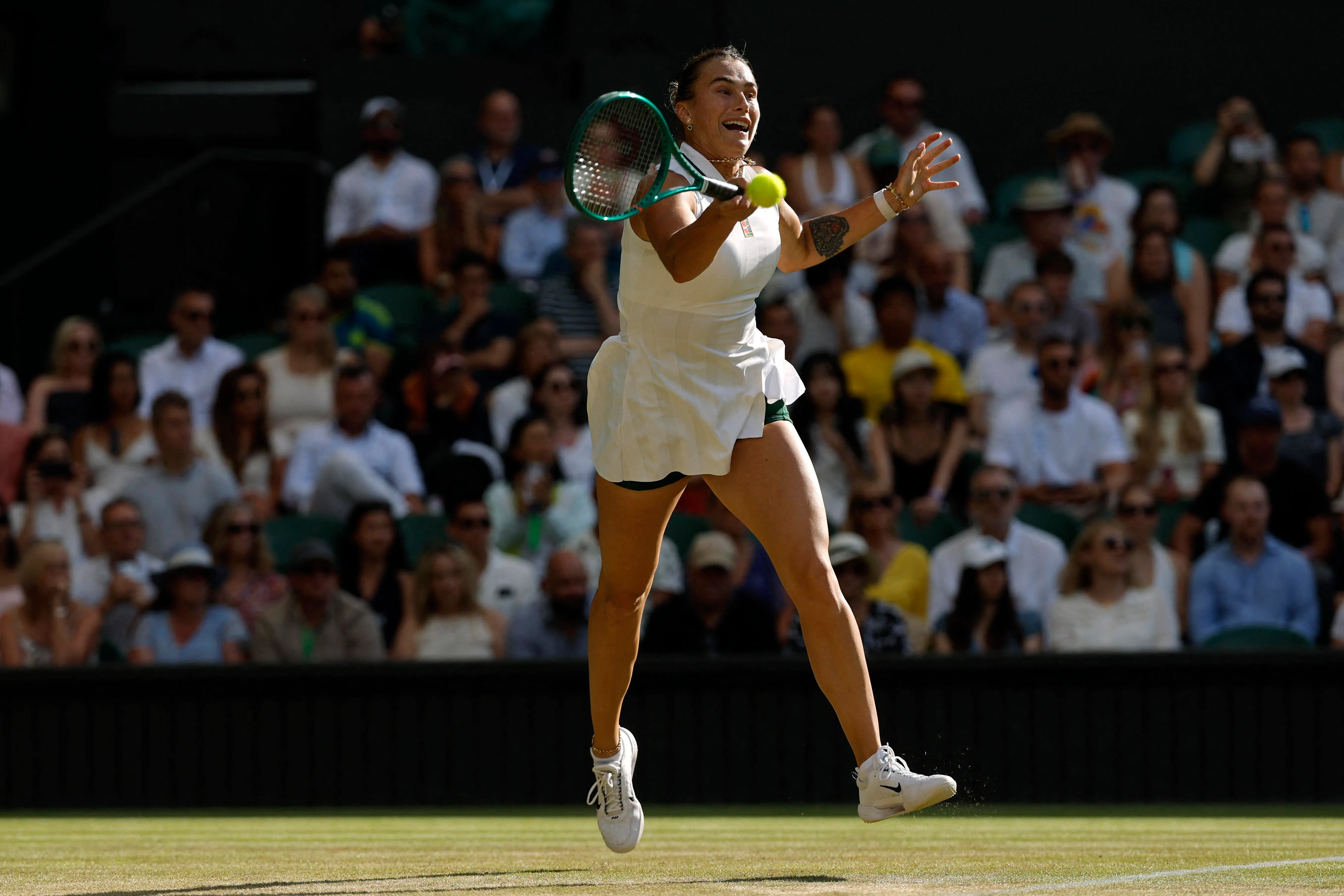 Tennis - Wimbledon - All England Lawn Tennis and Croquet Club, London, Britain - July 5, 2026 Belarus' Aryna Sabalenka in action during her fourth round match against Japan's Naomi Osaka REUTERS/Andrew Couldridge