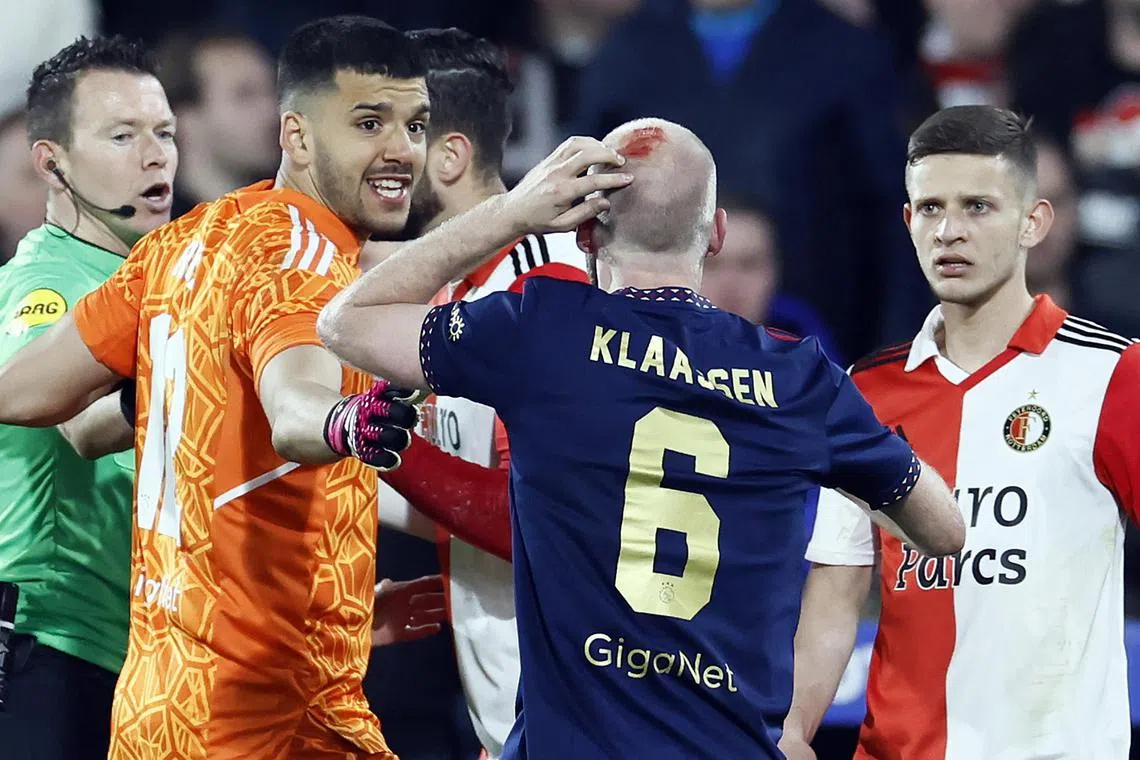 Davy Klaassen of Ajax reacting after being hit by an object during the Dutch Cup semi-final against Feyenoord on Wednesday. 