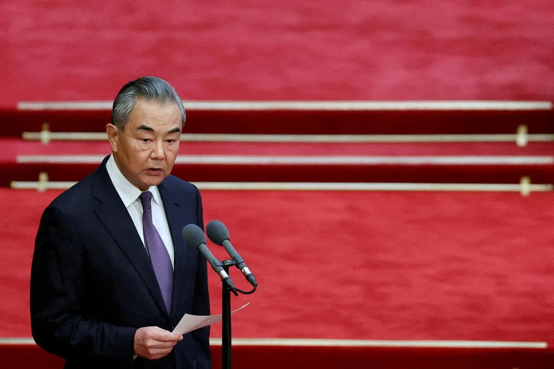 FILE PHOTO: Chinese Foreign Minister Wang Yi speaks at the opening ceremony of the ninth Forum on China-Africa Cooperation (FOCAC) Summit, at the Great Hall of the People in Beijing, China September 5, 2024. REUTERS/Florence Lo/File Photo