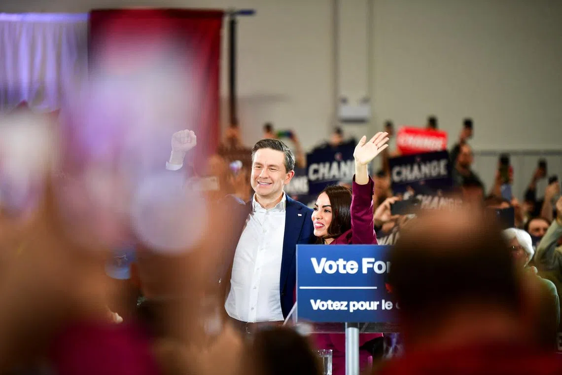 Conservative Party of Canada's leader Pierre Poilievre and his wife Anaida Poilievre attend a rally in Saskatoon, Saskatchewan, Canada April 24, 2025.  REUTERS/Nayan Sthankiya