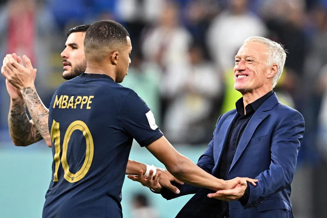 France coach Didier Deschamps celebrating with Kylian Mbappe after winning the World Cup 2022 Group D football match against Denmark at Stadium 947 in Doha on Saturday.