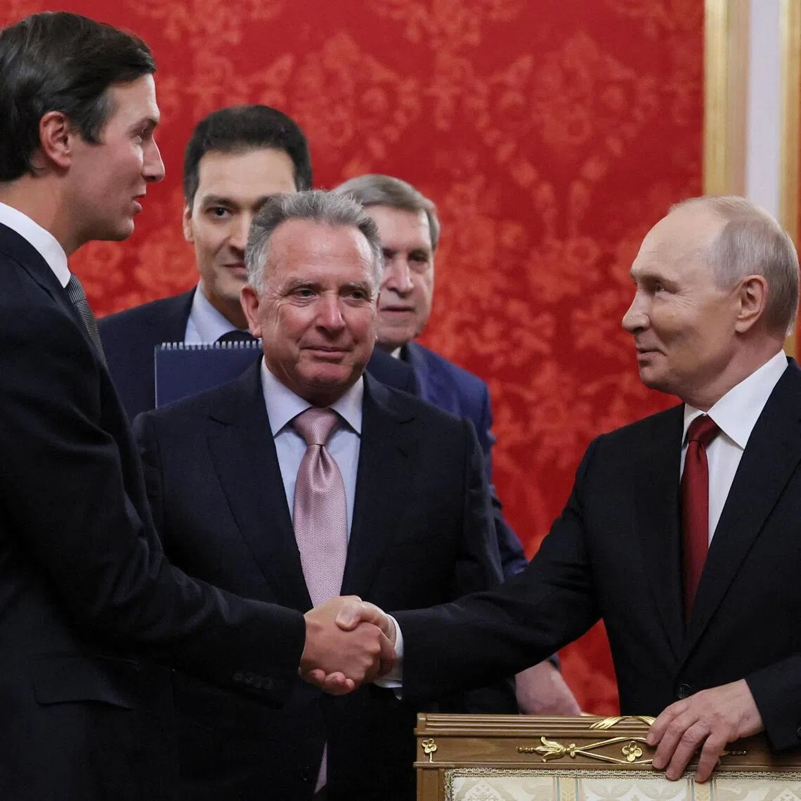 Russian President Vladimir Putin (right) shaking hands with Jared Kushner, US President Donald Trump’s son-in-law, as US Special Envoy Steve Witkoff looks on, at the Kremlin in Moscow, Russia, on Sept 5.