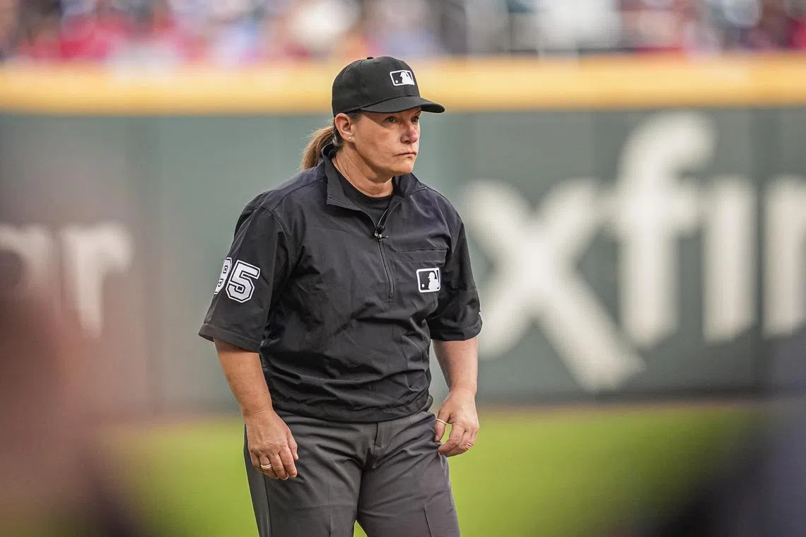 Umpire Jen Pawol on the field during the game between the Atlanta Braves and the Miami Marlins at Truist Park. 
