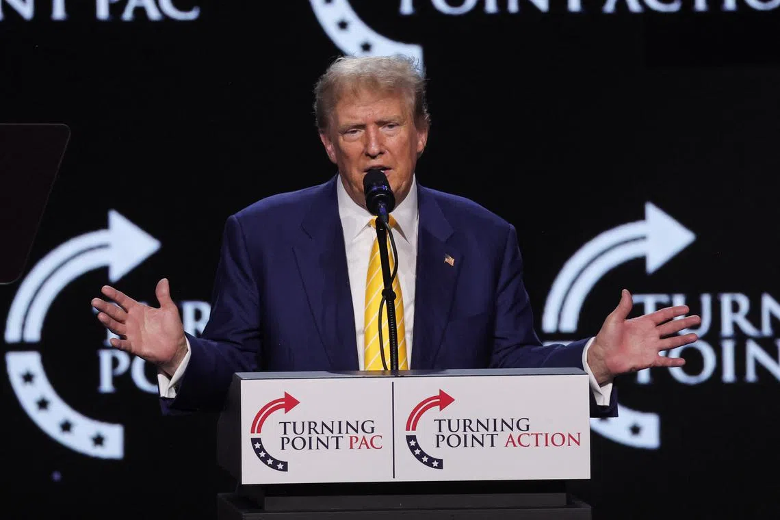 Republican presidential candidate and former U.S. President Donald Trump delivers a campaign speech during a Turning Point USA event at the Dream City Church in Phoenix, Arizona, U.S., June 6, 2024. REUTERS/Carlos Barria/File Photo