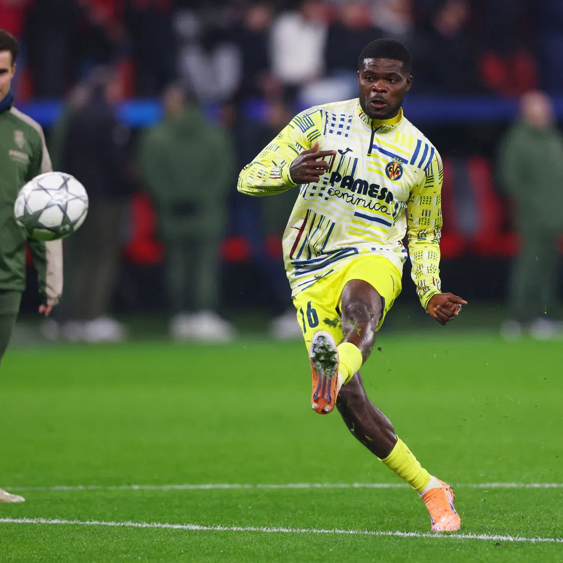 FILE PHOTO: Soccer Football - UEFA Champions League - Bayer Leverkusen v Villarreal - BayArena, Leverkusen, Germany - January 28, 2026 Villarreal's Thomas Partey during the warm up before the match REUTERS/Thilo Schmuelgen/ File Photo