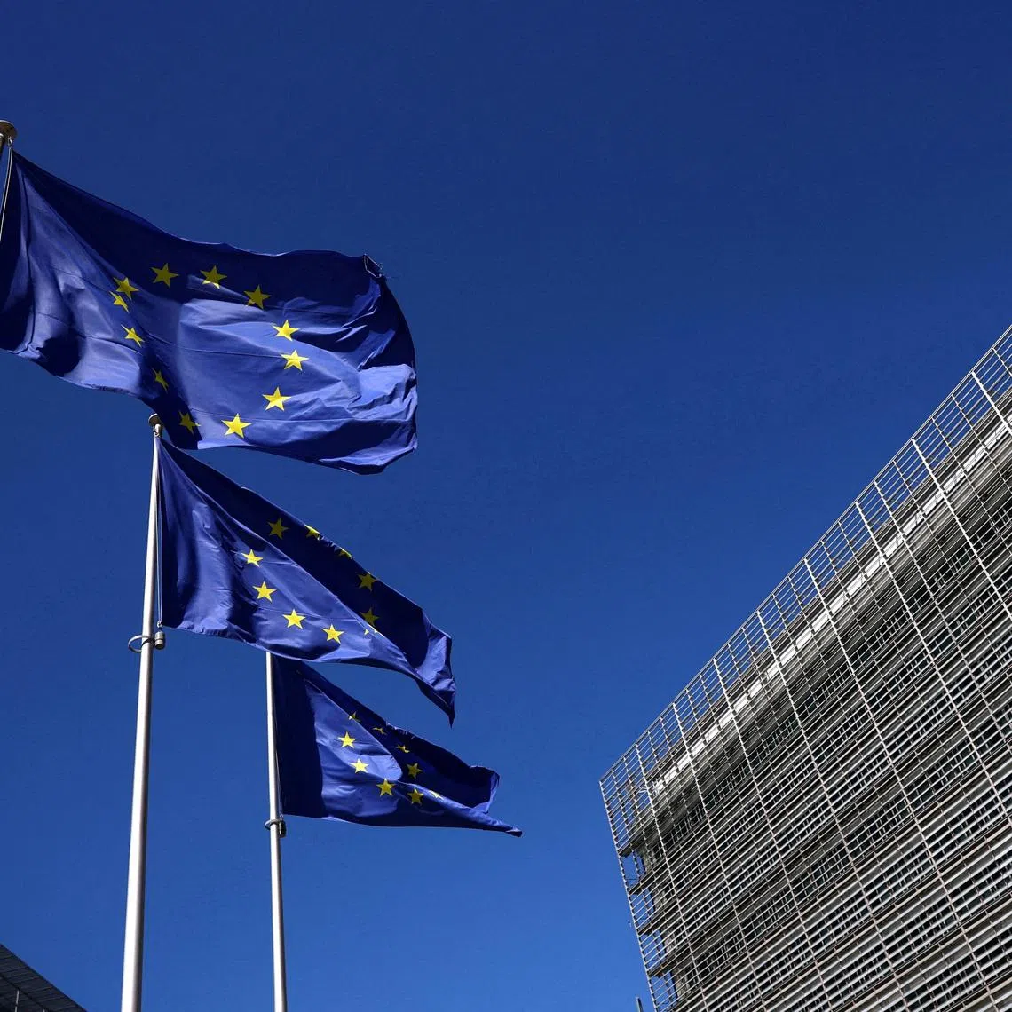 FILE PHOTO: European Union flags flutter outside the European Commission headquarters in Brussels, Belgium April 29, 2026. REUTERS/Yves Herman/File Photo