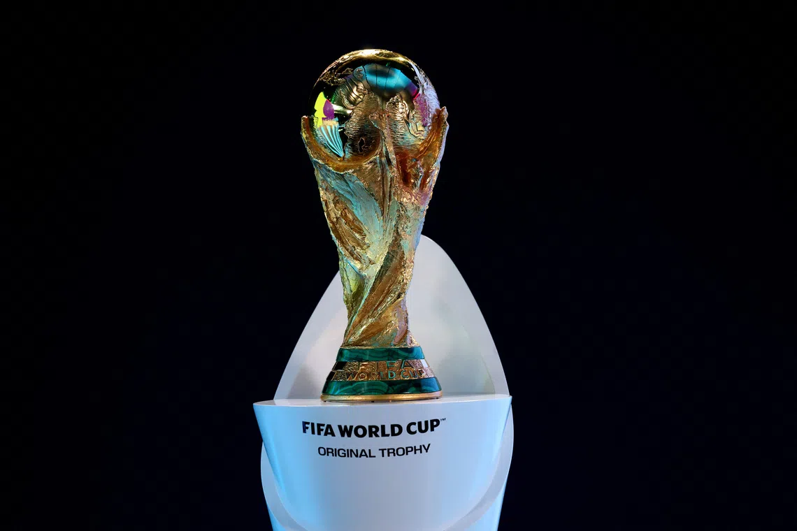 Soccer Football - World Cup Playoff Tournament and European Playoff draws - FIFA Headquarters, Zurich, Switzerland- November 20, 2025 The original FIFA World Cup trophy is kept on display during the draws REUTERS/Denis Balibouse